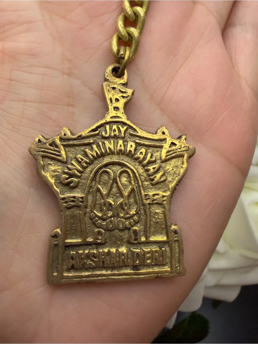 Gold Temple Keychain with Religious Motif